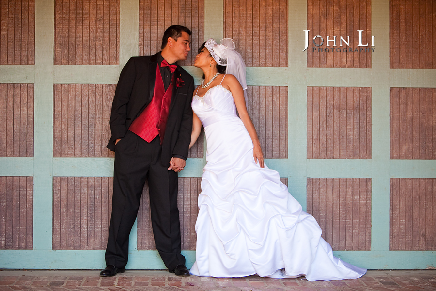 bride and groom kiss in vista de oro wedding