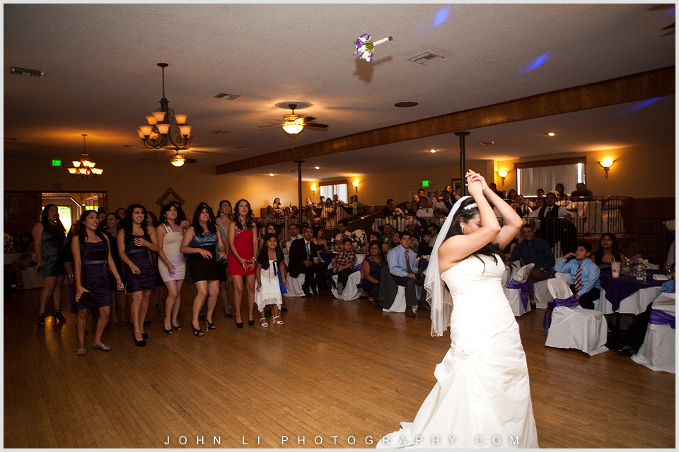 Bouquet toss DES Artesia Halls Wedding reception 