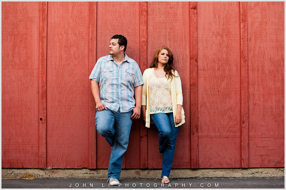 red background engagement photos in La Verne 