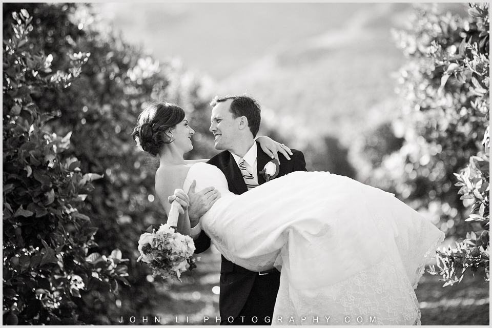  Limoneira Ranch wedding images  bride and groom kiss each other
