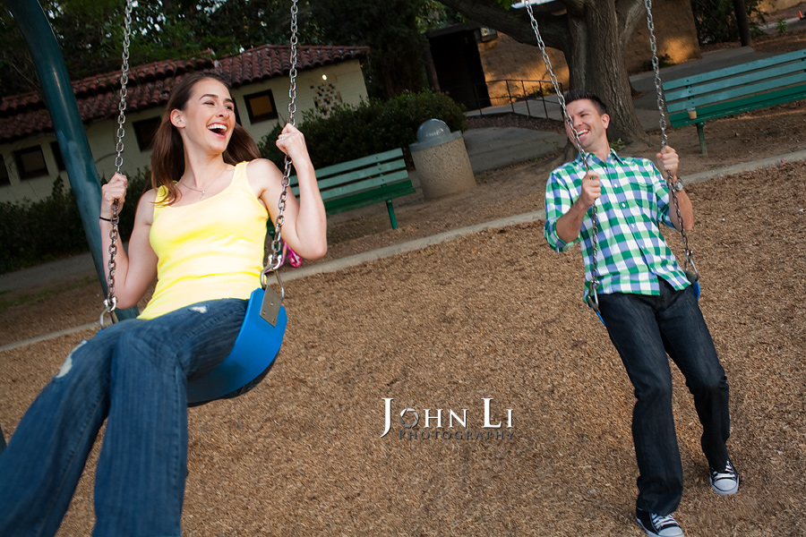 Swing engagement photos in Lacy park 