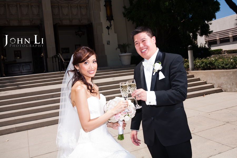 bride and groom drink champagene Holy Family Church South Pasadena