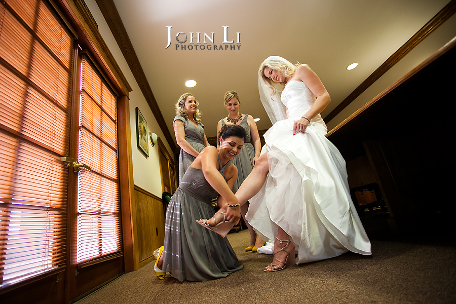 Limoneira Ranch Wedding photos girls help with wedding shoes